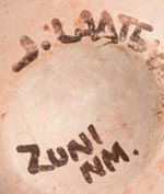 Artist signature of Jennie Laate, Zuni Pueblo Potter