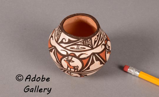 Alternate view of this pottery vessel showing miniature scale.