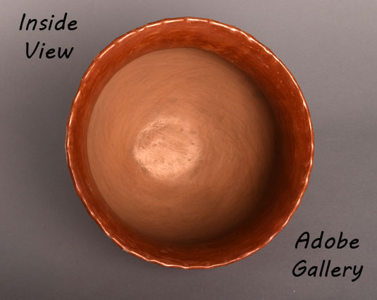 Alternate view of the inside of this pottery serving bowl.