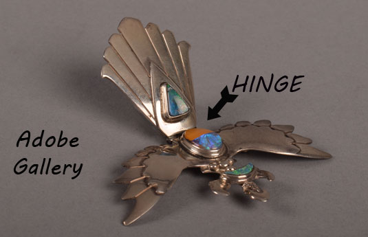 Alternate view of this pin showing the hinging functionality.