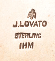 Julian Lovato (1922-2018) artist signature and hallmark.