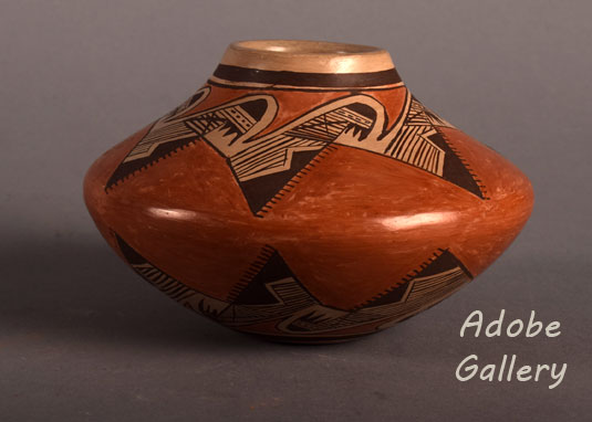 Alternate direct side view of this pottery seed jar.