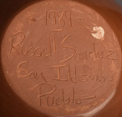 Artist Signature of Russell Sanchez, San Ildefonso Pueblo Potter
