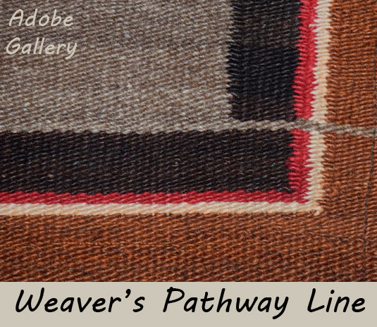 In the corner of the rug that contains a weaver’s pathway line, the weaver deliberately or mistakenly made changes in the dark orange and red stepped designs, by switching yarn from dark orange to red at the point of the last step of the design.  
