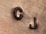 Signature of artist Corbet Joe, Diné Silversmith