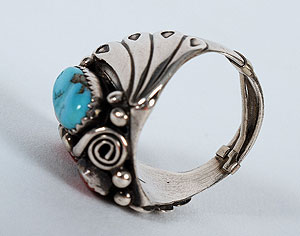  The ring was originally a size 11 but has been provided with a removable adjustment to be slightly snugger.