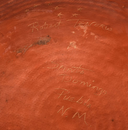 Artist Signature of Robert Tenorio, Kewa Pueblo Potter. The underbody near the base is signed “Robert Tenorio” and marked with his signature star pattern.  “Santo Domingo Pueblo, NM” is inscribed into the bottom.