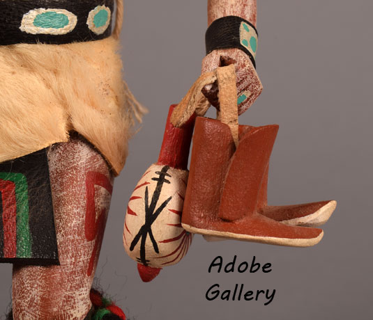 Alternate close up view of the rattle and moccasins. 