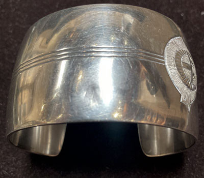 Condition: There is a very light dent to the surface of this silver cuff and overall, it is in very good condition.