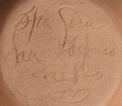 Artist signature of Crucita Gonzales Calabaza - Blue Corn, San Ildefonso Pueblo Potter