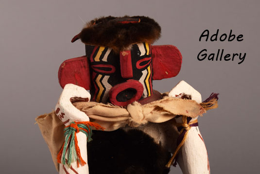 Close up view of the face of his Hopi Pueblo Katsina Doll.