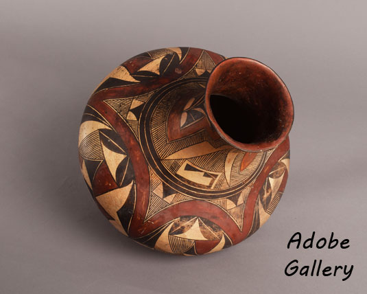 Alternate view of the inside of the neck of this pottery vessel.