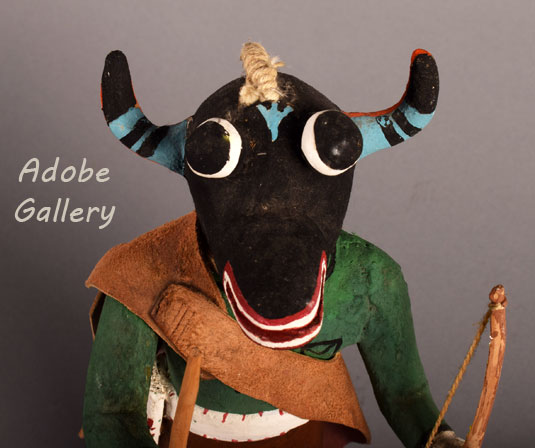 Alternate close up view of the face of this black ogre katsina.