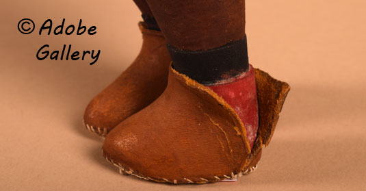 The maker added leather moccasins.