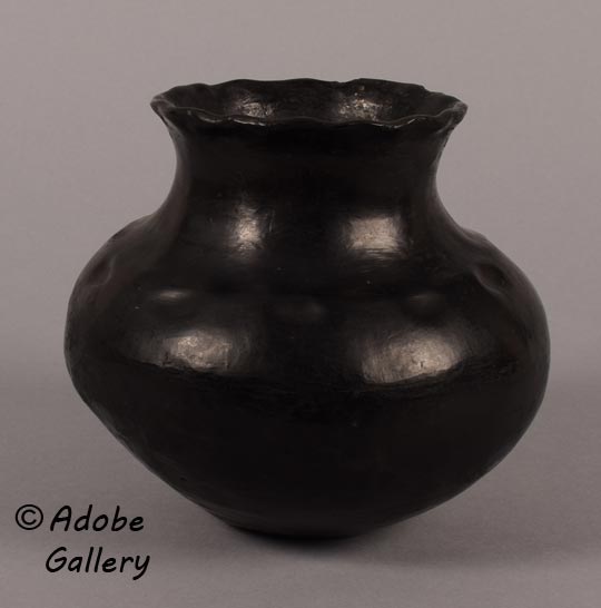 Alternate view of this black jar.