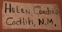 Artist signature of Helen Cordero, Cochiti Pueblo Potter