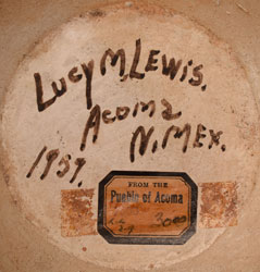 The bottom of the jar is signed and dated “Lucy M. Lewis, Acoma N. Mex 1959.” An early dealer’s label is affixed to the bottom of the jar. It reads “From the Pueblo of Acoma, L.L 2-9, $30.00.”