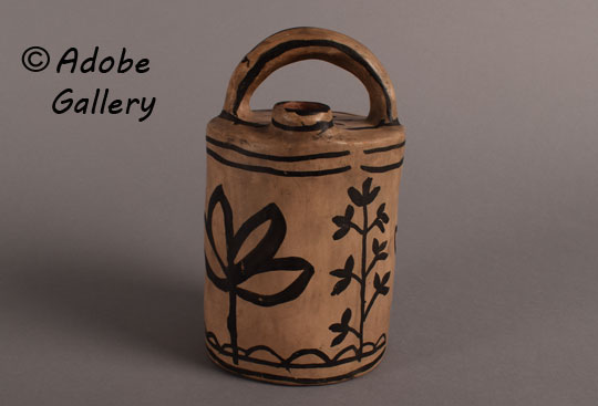 Alternate side view of this pottery canteen.
