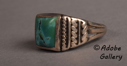 Alternate view showing the side designs of this silver and turquoise ring.