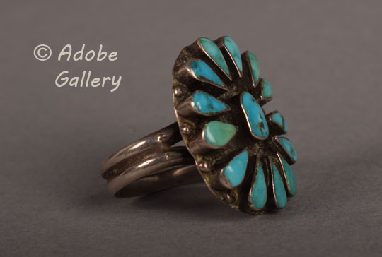 Alternate side view of this turquoise and silver ring.