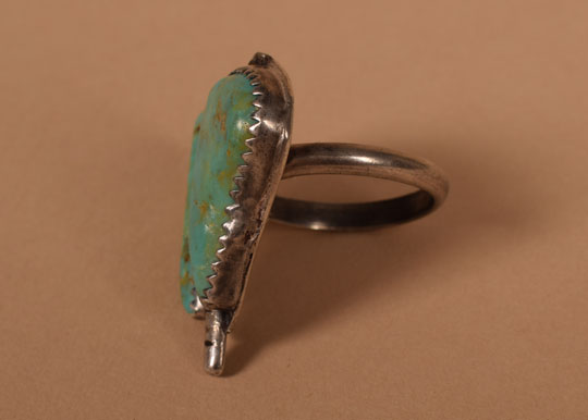 Alternate side view of this turquoise and silver Navajo ring.