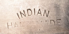 To distinguish between "machine made" jewelry, which some of the merchants were offering, others stamped the jewelry "INDIAN HAND MADE". 