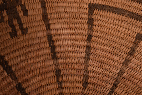 Close-up view of the basketry weave and designs.