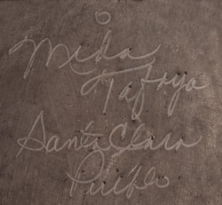 Artist signature of Mida Tafoya, Santa Clara Pueblo Potter