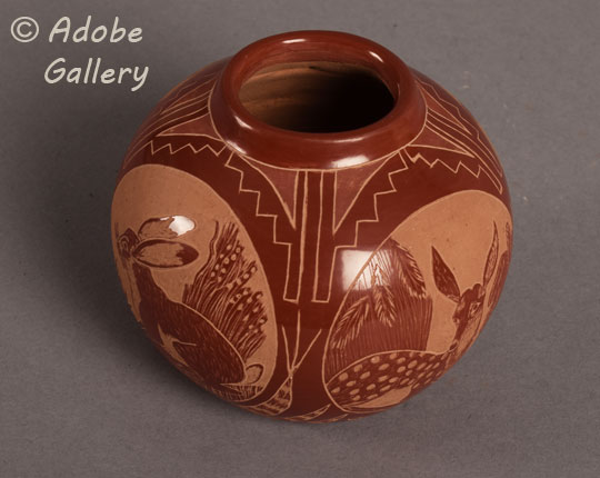 Alternate view of this miniature pottery vessel.