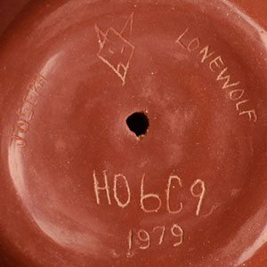 The bottom of the pot has the artist hallmark symbol and is signed Joseph Lonewolf, HO6C9, 1979.
