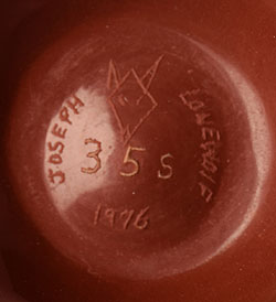 The bottom of the pot is signed Joseph Lonewolf, 35S 1976.