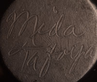 Artist signature of Mida Tafoya Santa Clara Pueblo Pottery