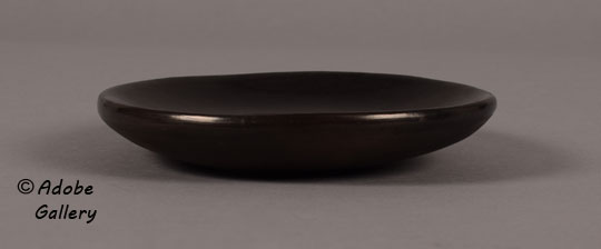 Alternate side view of this Maria Martinez blackware plate.
