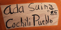 Artist signature and date (1985) of Ada Suina, Cochiti Pueblo Potter