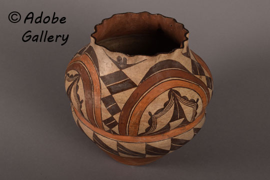 Alternate side view of this pottery jar.