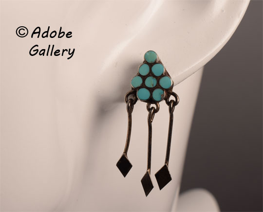 Alternate view of one of the earrings, as worn.