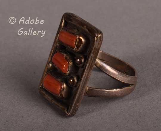 Alternate side view of this coral ring.