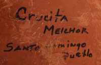 Artist signature of Crucita Melchor, Kewa Pueblo Potter