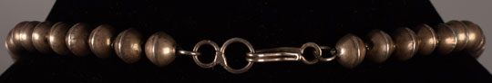 Alternate view showing the simple hook and loop to secure this necklace.