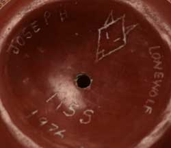 Artist signature and hallmark of Joseph Lonewolf, Santa Clara Pueblo Potter
