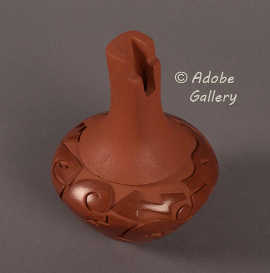 Alternate view of this redware carved pottery jar.