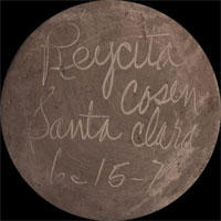 Artist signature of Reycita Cosen, Santa Clara Pueblo Potter