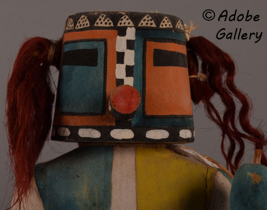 Close-up view of the face of this Katsina Doll.