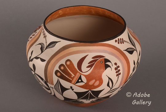 Alternate view of this pottery jar.  The orange slip is applied a couple of inches inside of the rim.