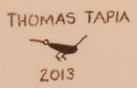 Artist signature of Thomas Tapia, Tesuque Pueblo