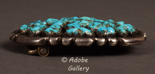 Alternate side view of this turquoise buckle.