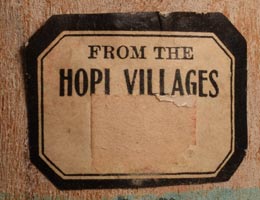 Pasted to the back is a paper label reading “From the Hopi Villages.”