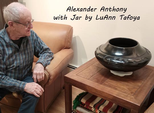 Al Anthony showing the scale of this blackware vessel.