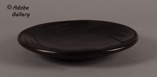 Alternate side view of this blackware plate.