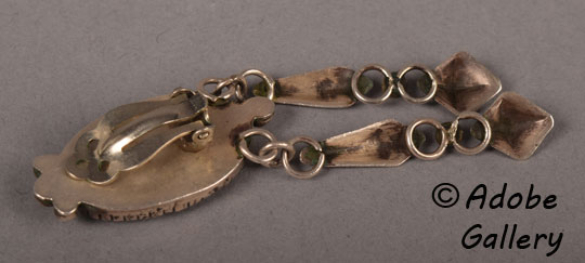 These earrings are clip-on.